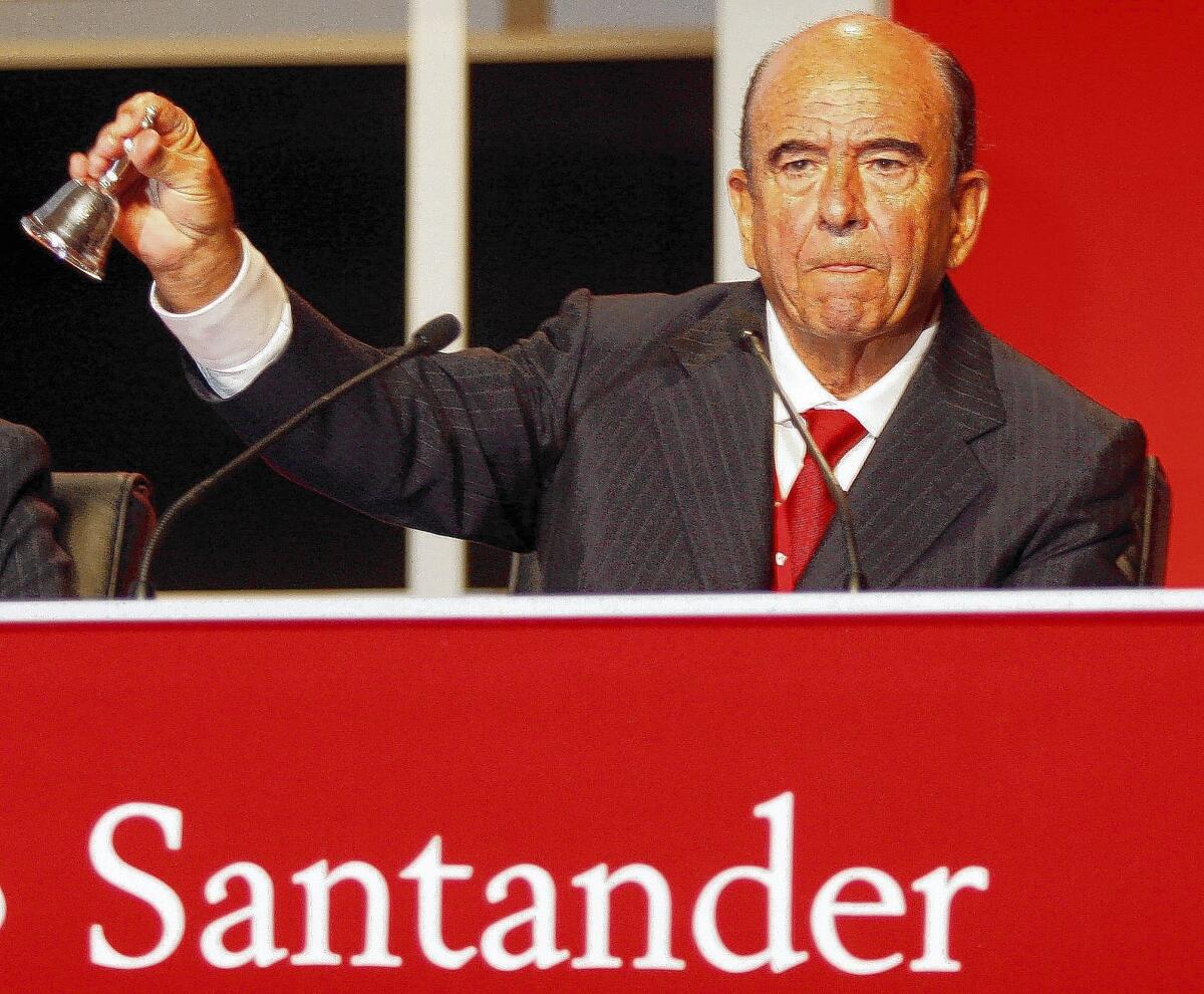 Emilio Botin rings a bell at the start of a Banco Santander shareholders meeting in 2006. The Spanish businessman was known for his hands-on leadership of the bank, which is Spain's biggest.