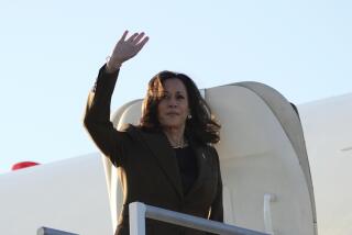 Democratic presidential nominee Vice President Kamala Harris waves while boarding Air Force Two, Sunday, Sept. 29, 2024, in Los Angeles. (AP Photo/Mark J. Terrill)