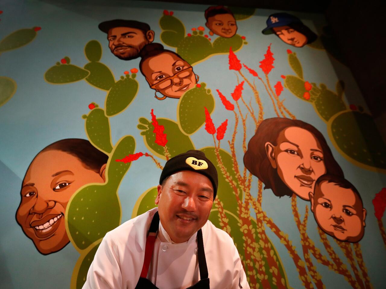 Chef Roy Choi is photographed next to a mural located inside the dining room of his new restaurant, Best Friend, inside the Park MGM hotel on the Las Vegas Strip.