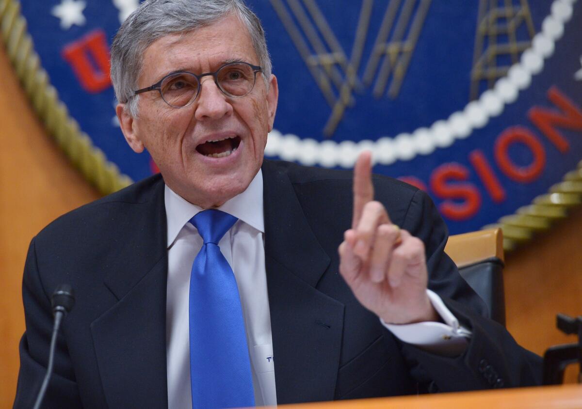 Tom Wheeler, chairman of the Federal Communications Commission, speaks during a Feb. 26, 2015, meeting at which the agency approved net neutrality regulations.