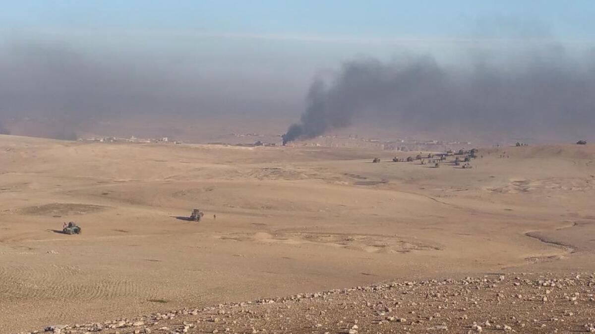 Iraqi forces bear down on the village of Lazakah on the outskirts of Mosul on Feb. 19.