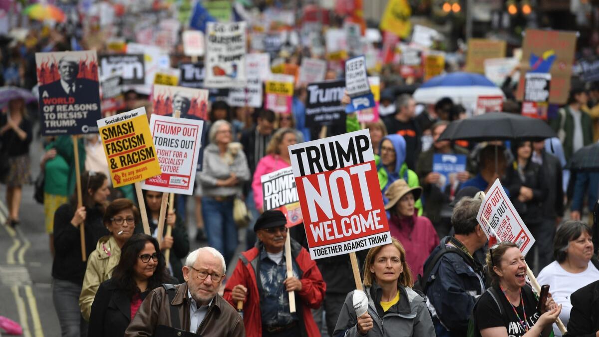 Anti-Trump protesters march down Whitehall in London on June 4.