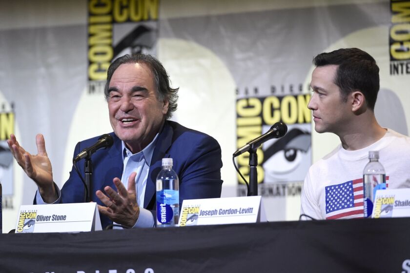 Director/writer Oliver Stone, left, and Joseph Gordon-Levitt attend the "Snowden" panel on day 1 of Comic-Con International on Thursday, July 21, 2016, in San Diego. (Photo by Chris Pizzello/Invision/AP)