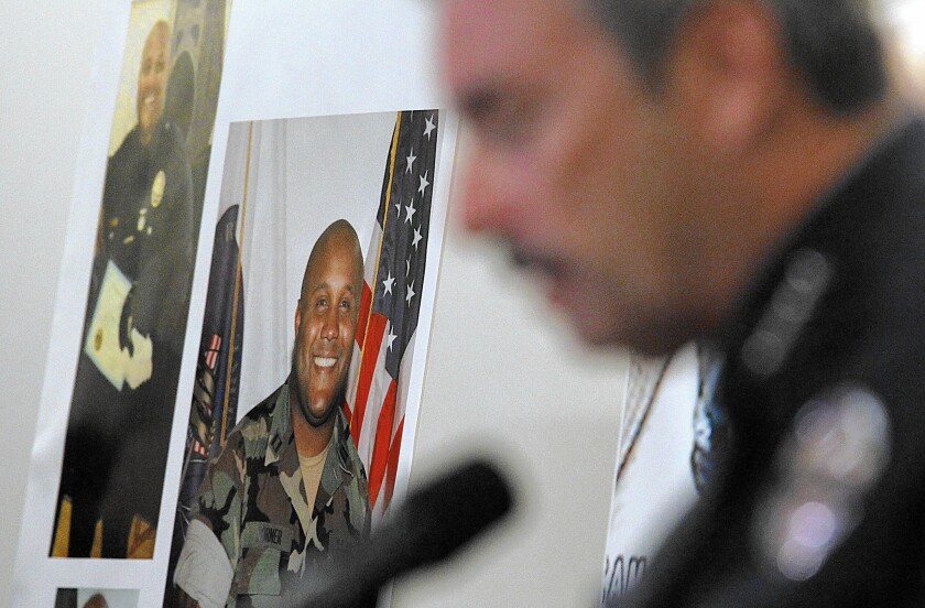 LAPD Chief Charlie Beck talks to reporters about Christopher Dorner at a Feb. 7, 2013 press conference.