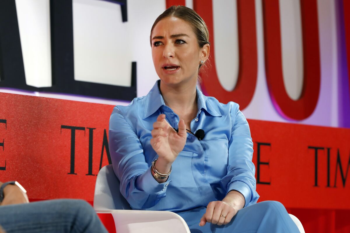 FILE - In this Tuesday, April 23, 2019 file photo, Founder and CEO of Bumble, Whitney Wolfe Herd, speaks during the TIME 100 Summit, in New York. The Texas law, which took effect Tuesday, Aug. 31, 2021, after the Supreme Court denied an emergency appeal from abortion providers, bans abortions once medical professionals can detect cardiac activity, usually around six weeks and often before women know they’re pregnant. Austin-based Bumble, which is led by CEO Whitney Wolfe, spoke out against the law on social media. “Bumble is women-founded and women-led, and from day one we’ve stood up for the most vulnerable. We’ll keep fighting against regressive laws like #SB8,” Bumble said on Twitter. (AP Photo/Richard Drew, File)