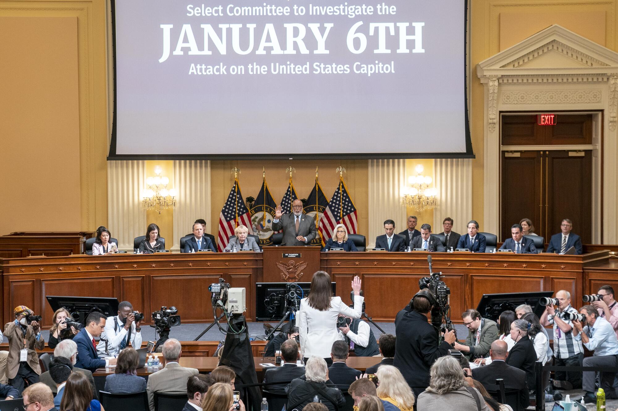 Cassidy Hutchinson, former aide to then White House chief of staff Mark Meadows, is sworn in 