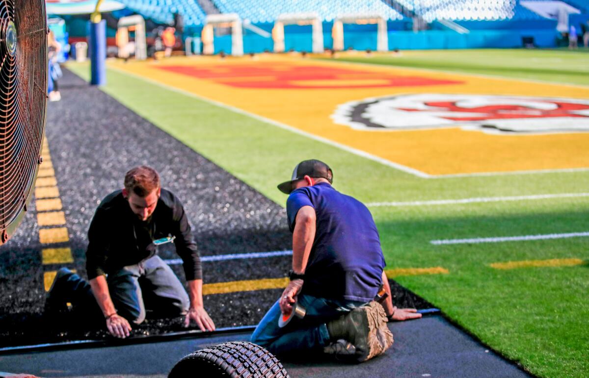 Workers prepare for Super Bowl at Hard Rock Stadium in Miami Gardens, Fla., on Jan. 28.