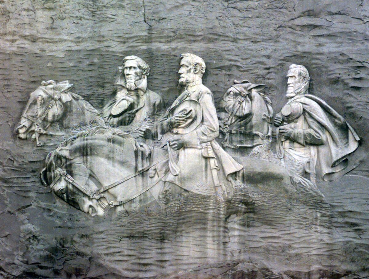 The Confederate Memorial Carving on Stone Mountain, Ga., depicts Confederate President Jefferson Davis and Gens. Robert E. Lee and Stonewall Jackson in relief.
