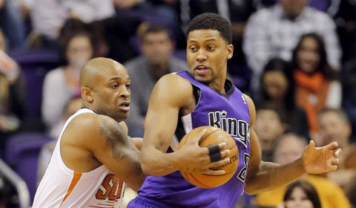 Rudy Gay had 24 points for the Kings during a 116-107 loss Friday to the Phoenix Suns after being traded to Sacramento by the Toronto Raptors on Dec. 10.