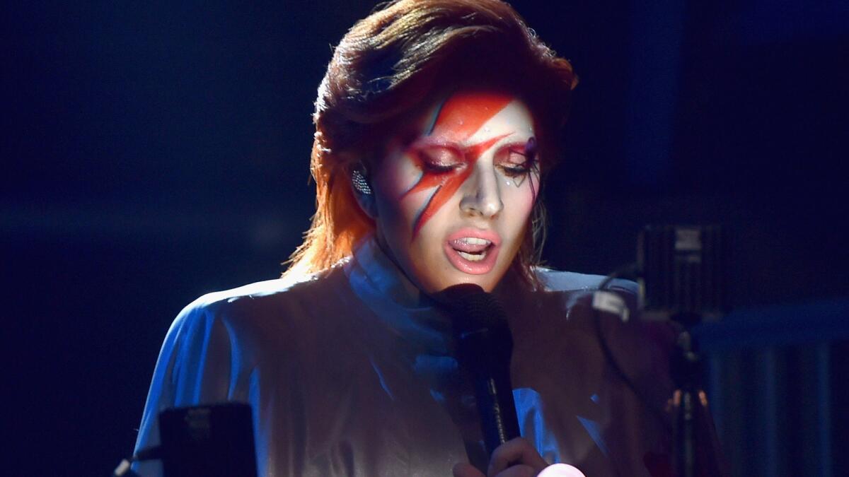 Singer Lady Gaga performs a tribute to the late David Bowie during the 58th Grammy Awards