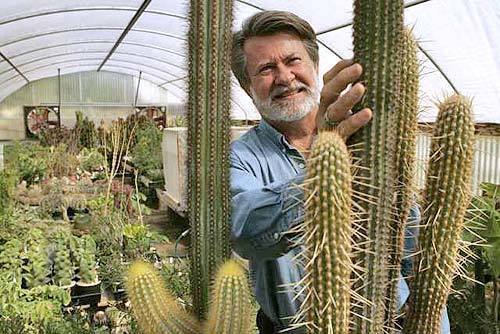 Green thumb Wendell "Woody" Minnich, with columnar cactuses from Brazils Minas Gerias region, travels the world to talk about and collect rare cactuses and succulents. He also sells many of the plants he keeps in his backyard greenhouses and arbors.