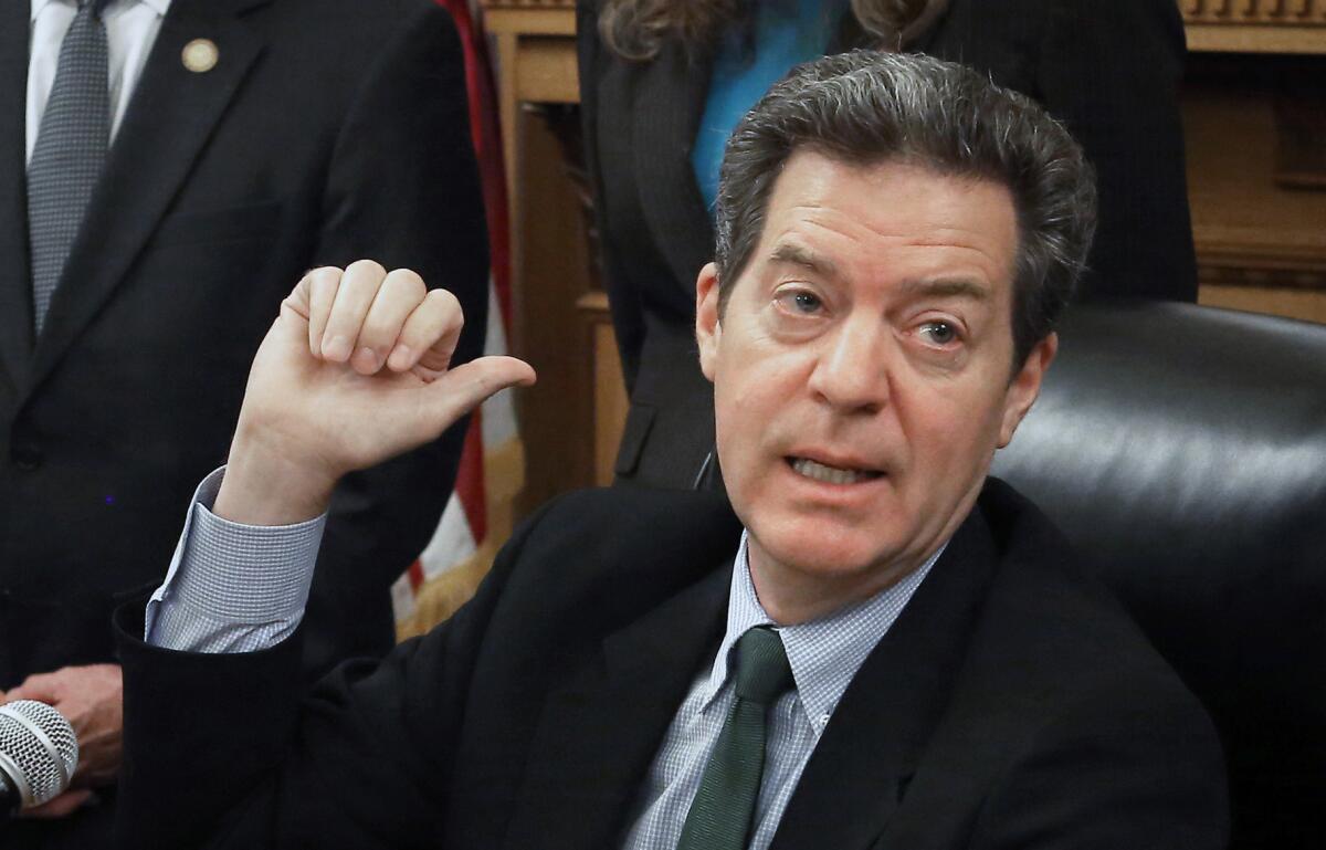 Kansas Gov. Sam Brownback recently signed a law that would defund the state courts if any of its judges rule that a controversial court reform law is unconstitutional.