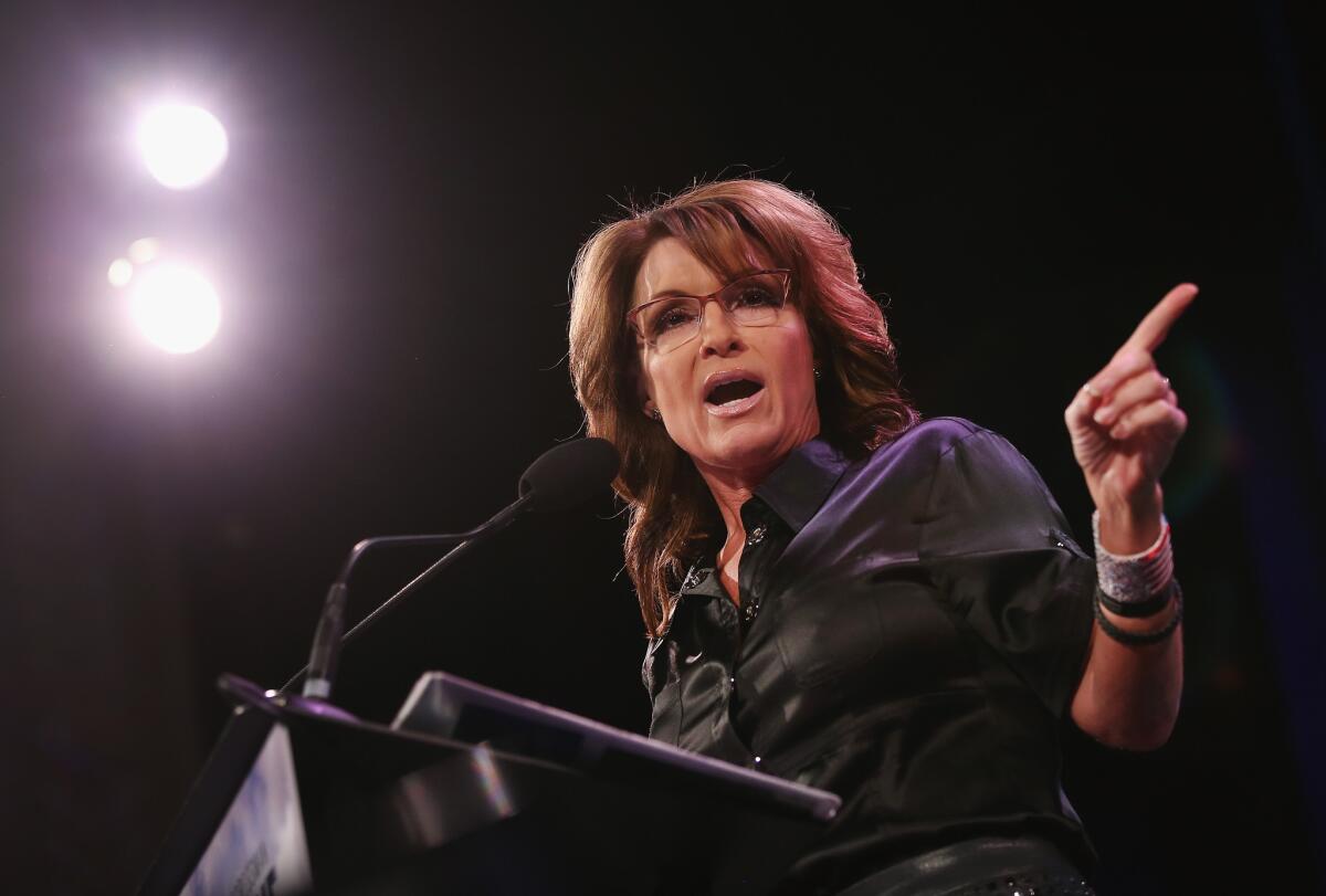 Sarah Palin, shown in January, took to Facebook on Thursday night to defend Curt Schilling and his controversial tweet.