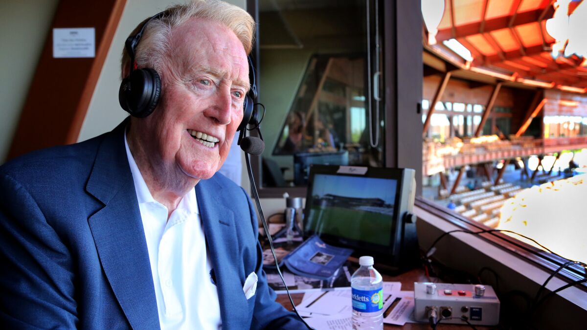 Vin Scully calls a Dodgers spring training game at Camelback Ranch in Phoenix on March 25, 2016.