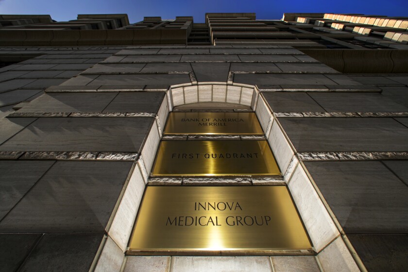 Exterior of an office building with a sign for Innova Medical Group