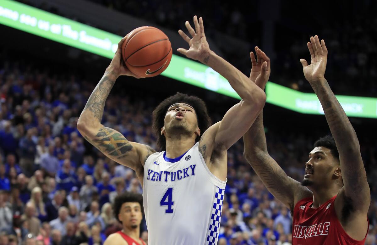 Kentucky's Nick Richards goes up for a shot in the Wildcats' 78-70 overtime win over Louisville on Dec. 28, 2019.