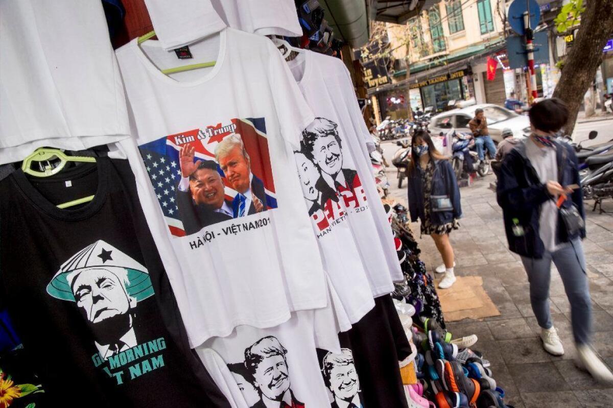 T-shirts depicting President Trump and North Korean leader Kim Jong Un are displayed for sale in a tourist area in Hanoi.