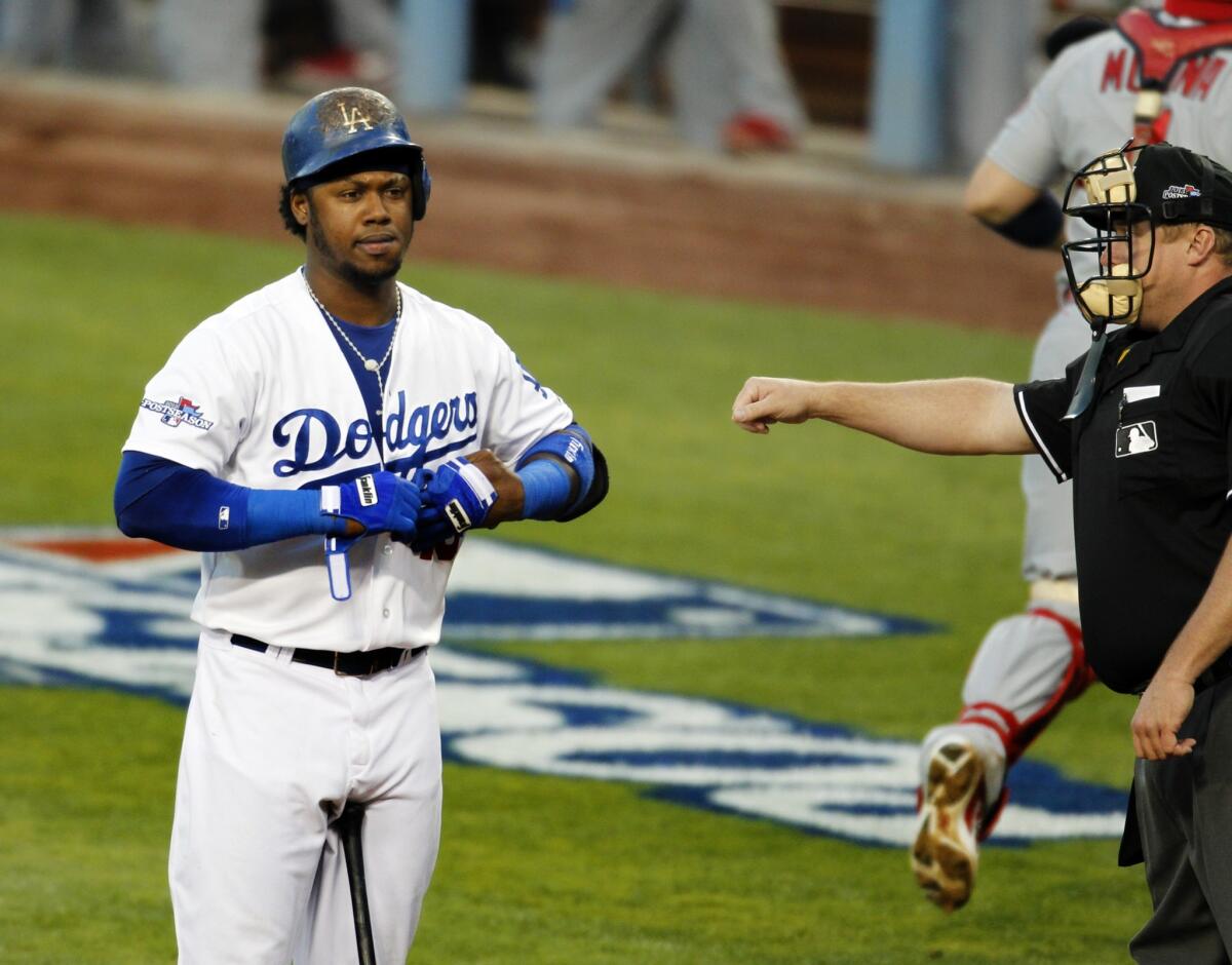 Dodgers shortstop Hanley Ramirez continues to be hampered by a broken rib he suffered last week in Game 1 of the National League Championship Series.