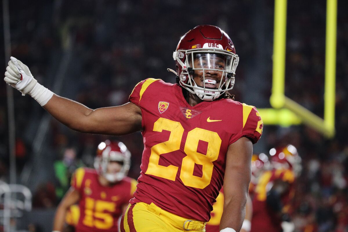 USC running back Keaontay Ingram celebrates after scoring a touchdown against Oregon State