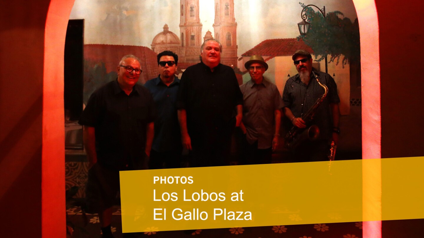 Los Lobos members Conrad Lozano, left, Cesar Rosas, David Hidalgo, Louie Perez and Steve Berlin before performing an intimate concert for family and friends to celebrate their new album, "Gates of Gold," at El Gallo Plaza in East Los Angeles on Sept. 29.