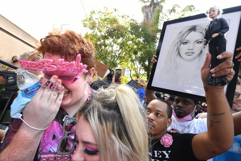 Los Angeles, CA. September 29, 2021: Britney Spears fan that goes by the name Jakeyonce, cries outside the courtroom after the announcement that Britney Spears' father, Jamie spears, is suspended from her conservatorship in Los Angeles Wednesday. (Wally Skalij/Los Angeles Times)