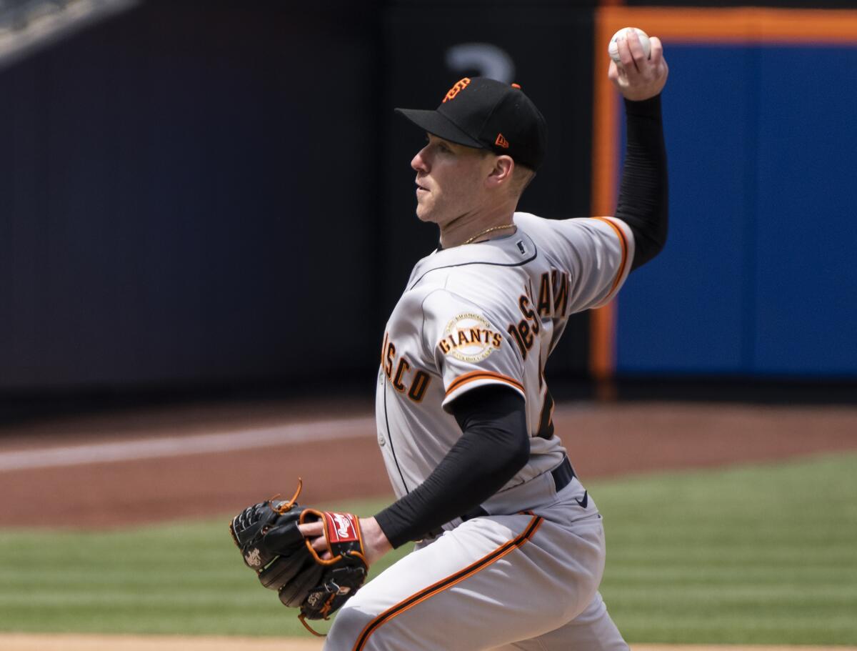 Anthony DeSclafani of the San Francisco Giants is taken out of the