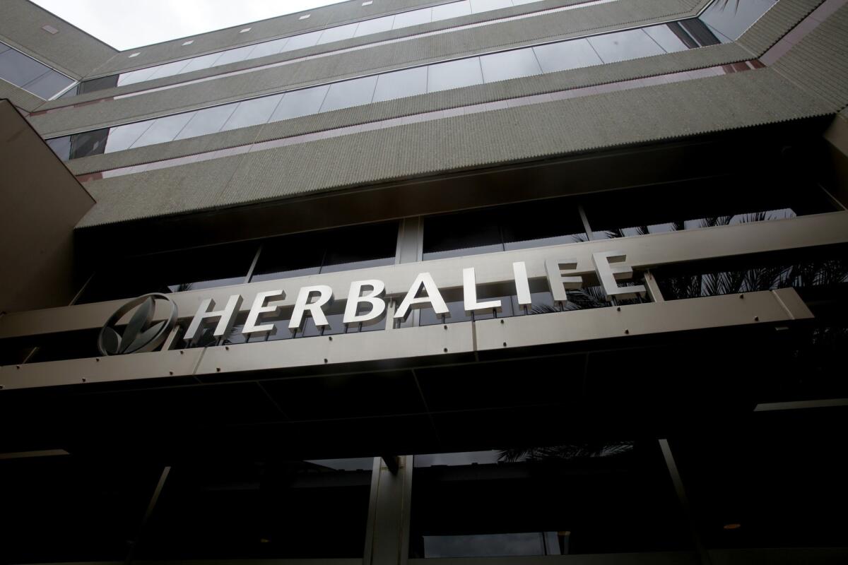 Nutritional products maker Herbalife has fended off the allegations of operating a pyramid scheme, as Carl Icahn, George Soros and several other high-profile investors bought large stakes in the company.