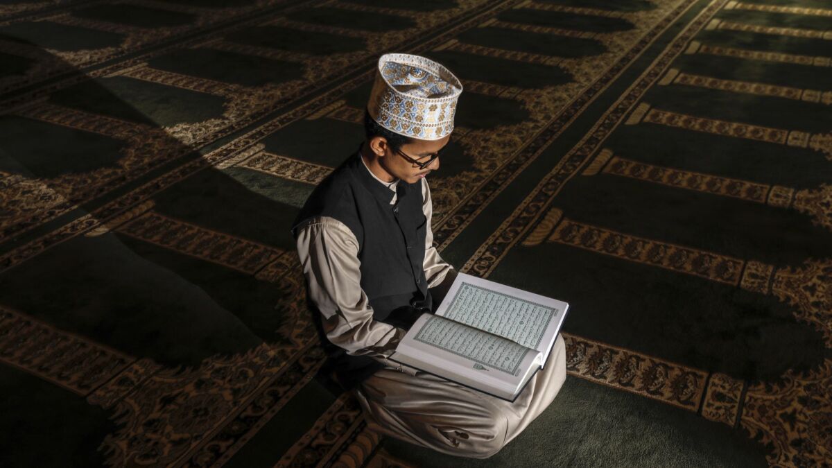 Abdonrosak Mahachal, 35, leads nightly prayers during the month of Ramadan. Mahachai is a hafiz — a person who has memorized the entire Koran.