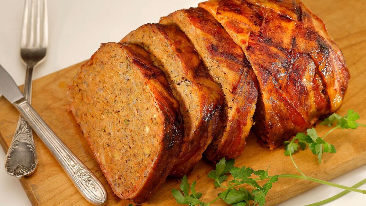 Layer your meatloaf with strips of bacon in this bacon-wrapped meatloaf.