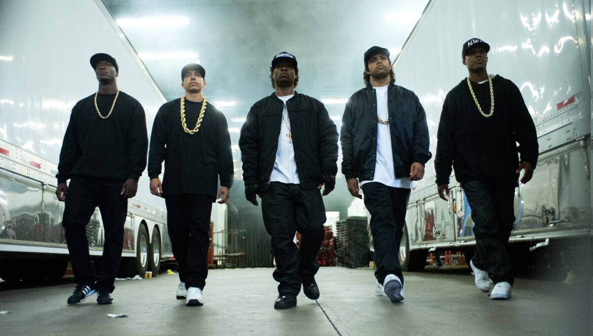 This photo provided by Universal Pictures shows, Aldis Hodge, left, as MC Ren, Neil Brown Jr. as DJ Yella, Jason Mitchell as Eazy-E, O’Shea Jackson Jr. as Ice Cube and Corey Hawkins as Dr. Dre, in the film “Straight Outta Compton."