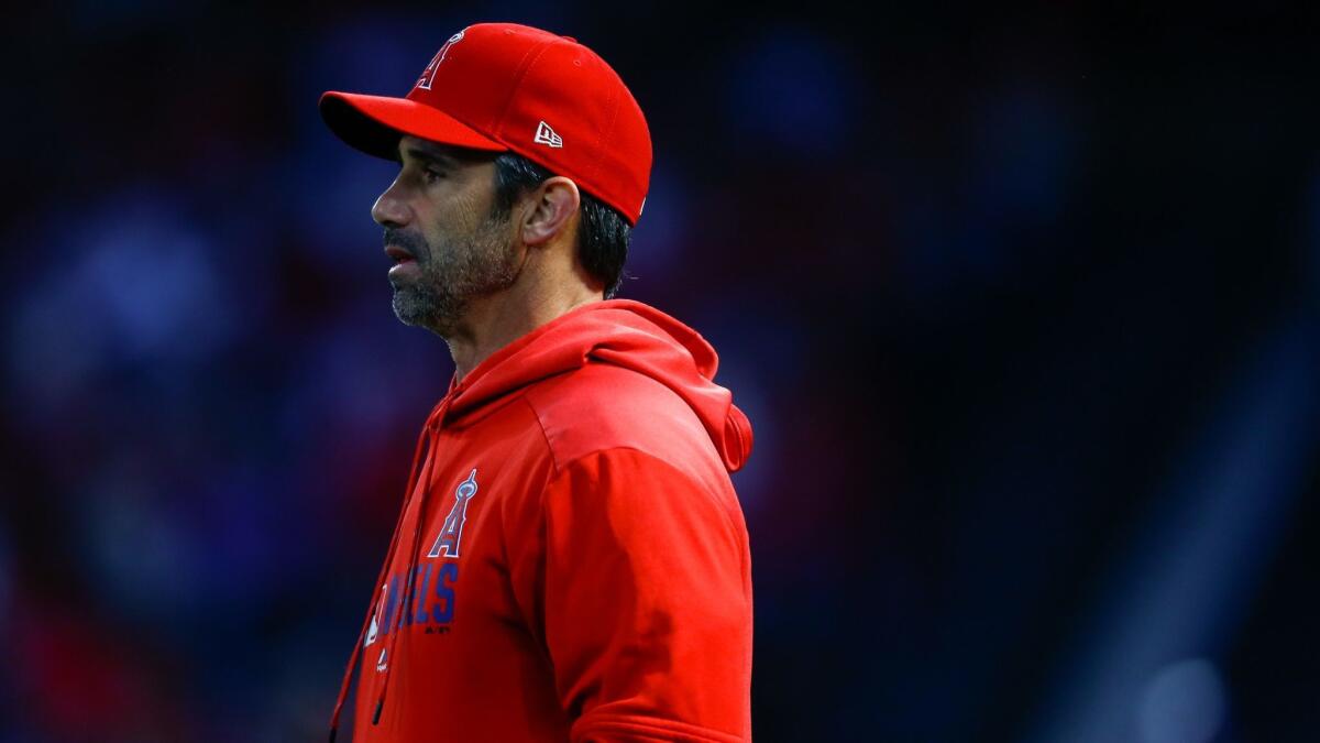 Angels manager Brad Ausmus looks on during the team's home opener against the Texas Rangers on April 4.