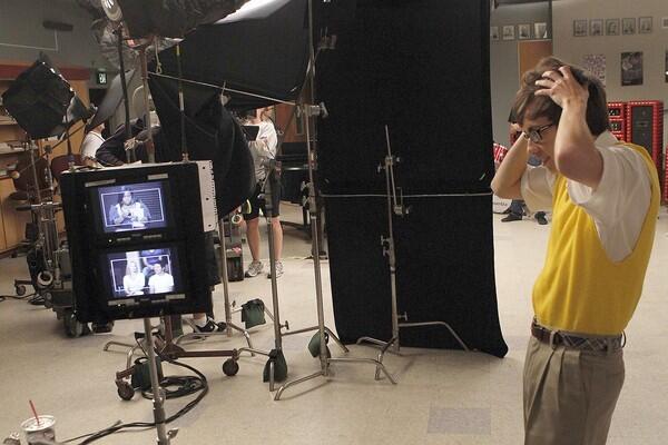 Kevin McHale does a little skit with his free moments on the Paramount set of "Glee."
