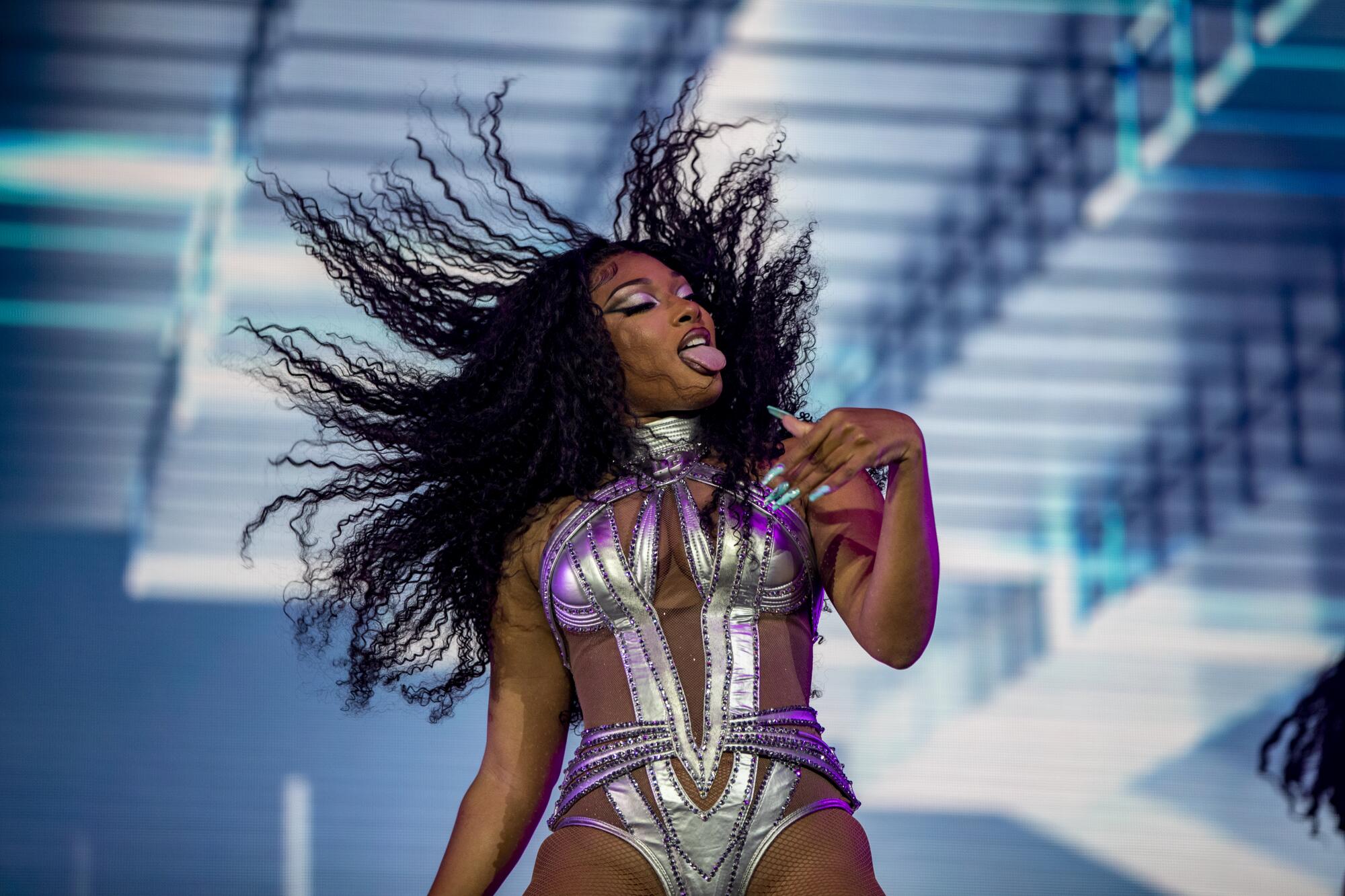 Megan Thee Stallion pauses during her day-two performance.