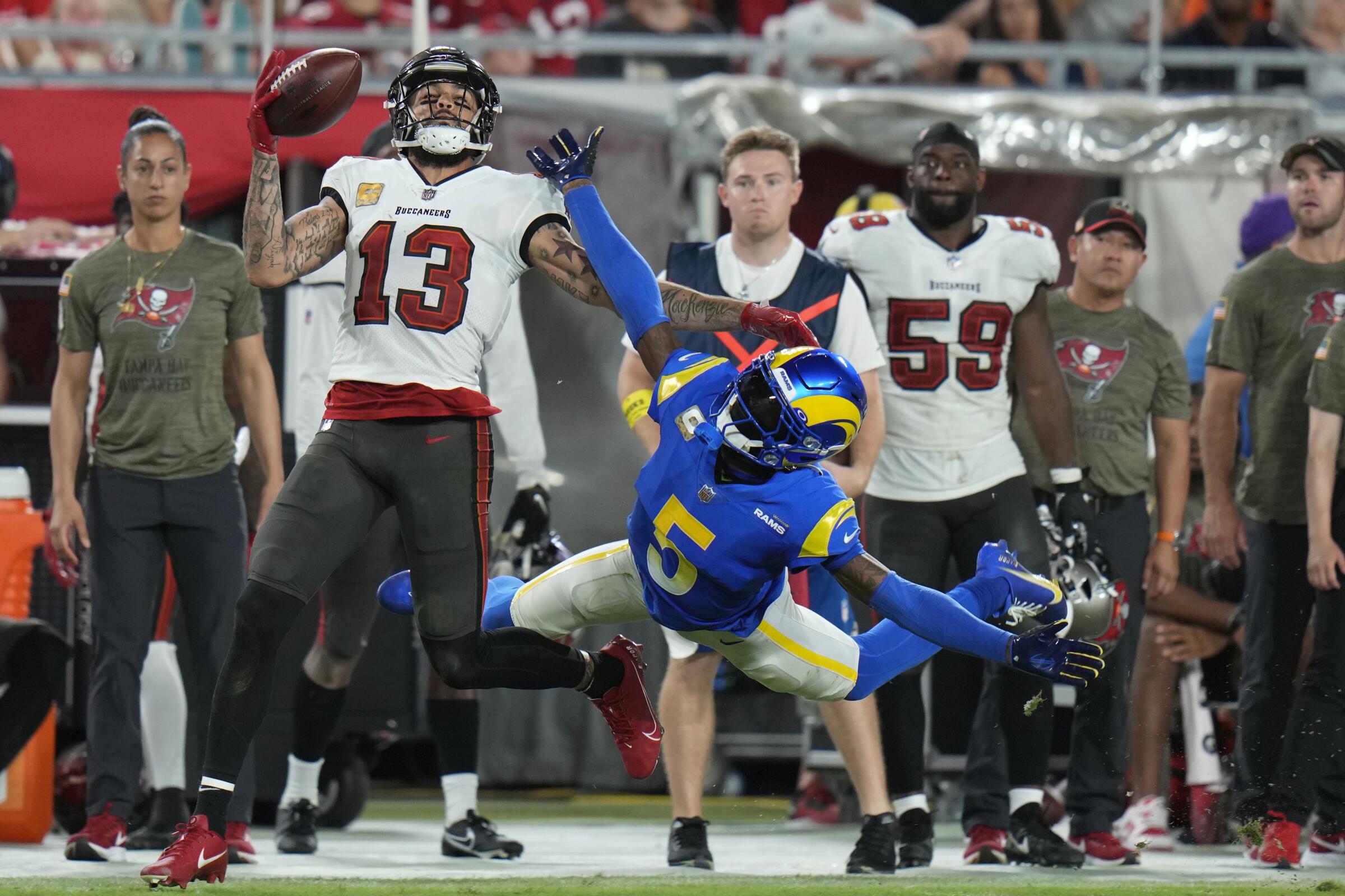 Rams cornerback Jalen Ramsey breaks up a pass intended for Tampa Bay Buccaneers wide receiver Mike Evans.