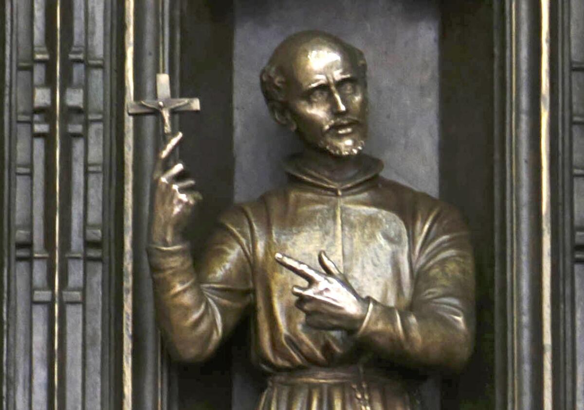 A statue of Isaac Jogues, a Jesuit missionary who worked among Native Americans, stands at St. Patrick's Cathedral in New York.