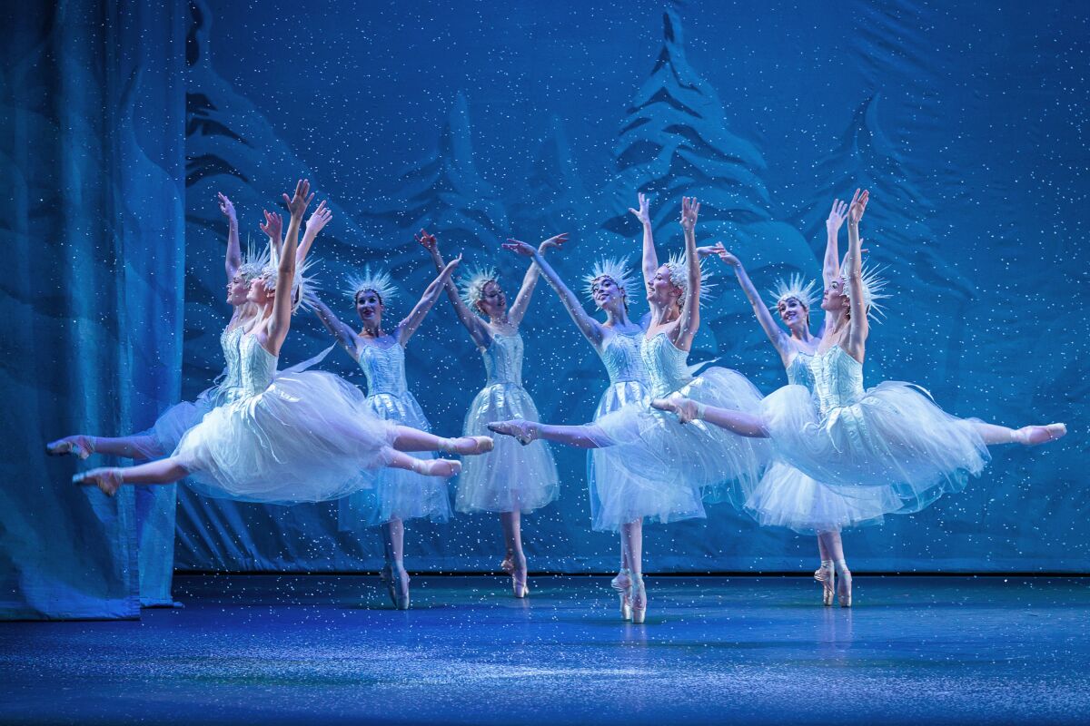 Ballet dancers dressed as snowflakes