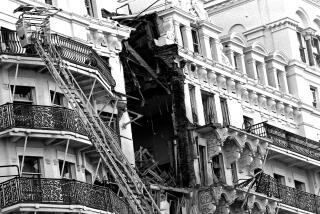A gaping hole in the 5th floor level in the facade of the Grand Hotel in Brighton, England on Oct. 12, 1984, following a bomb explosion. Britain's Prime Minister Margaret Thatcher and most of her 22 member cabinet were staying at the hotel for their party's conference. The windows of Mrs. Thatcher's rooms were blown out in the blast and the bathroom of her suite were badly damaged. (AP Photo/Dave Caulkin)