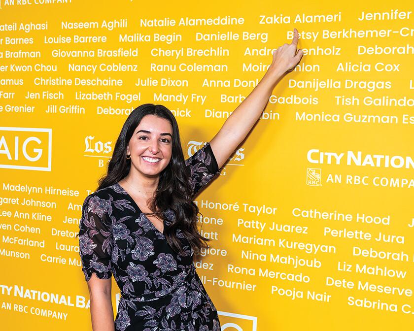 Zakia Alameri (Omega Accounting Solutions) proudly points out her name on the wall of nominees.