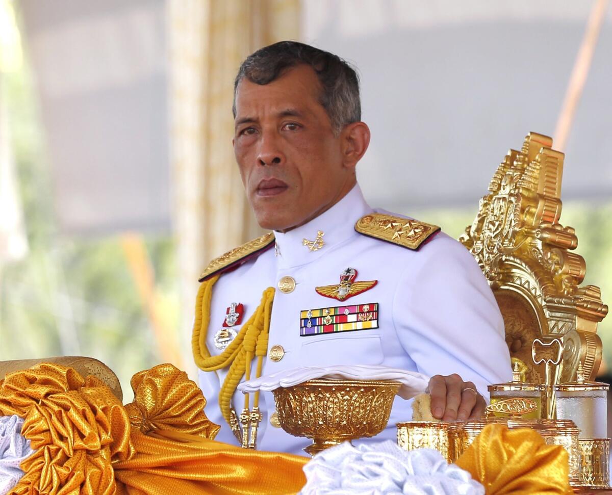 Thai Crown Prince Maha Vajiralongkorn presides over the Royal Ploughing ceremony at Sanam Luang in Bangkok on May 9.