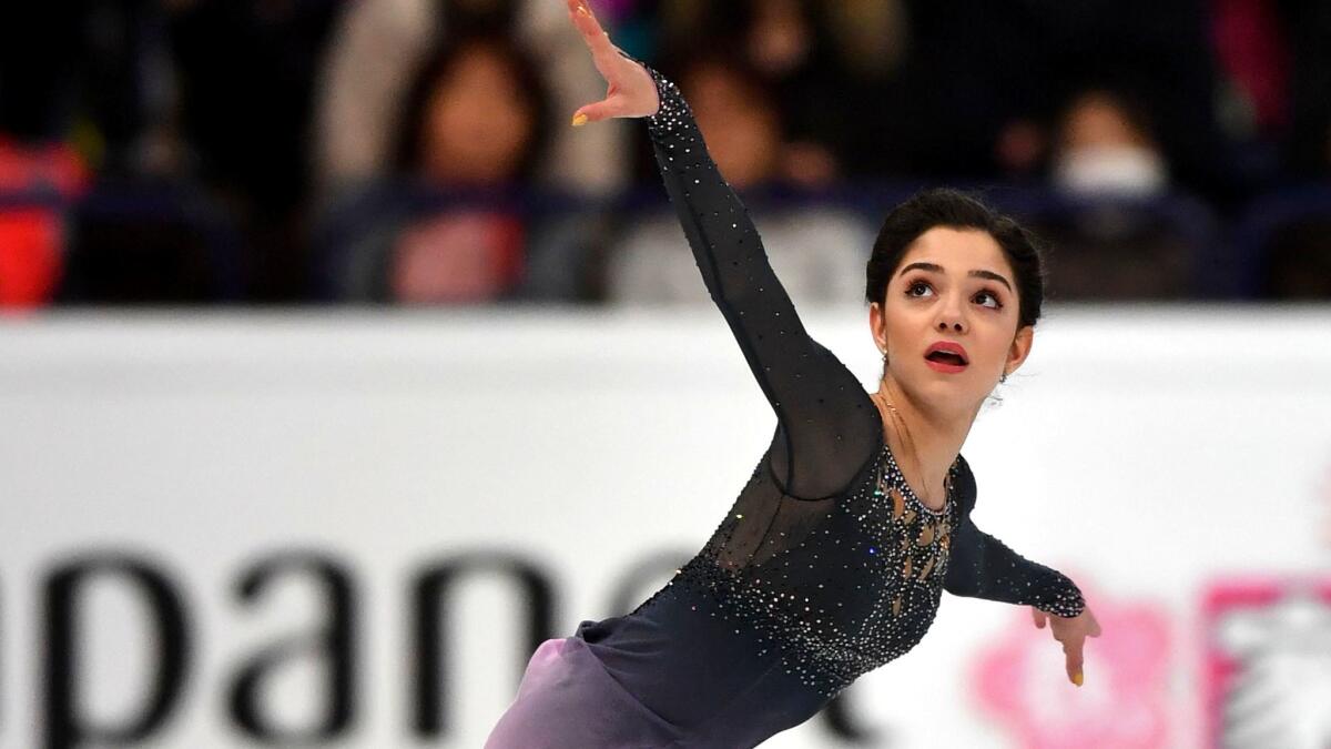 Evgenia Medvedeva performs her free skate during the world championships on Friday.