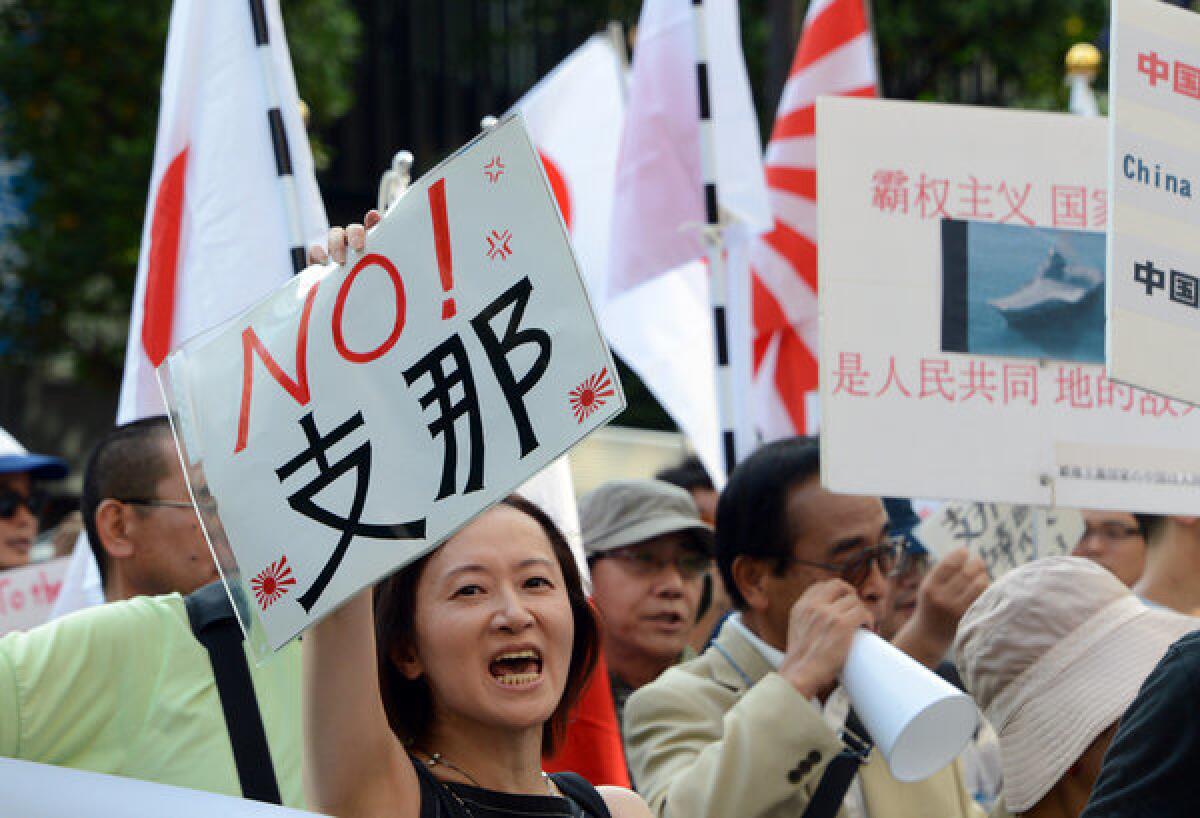 Protesters shout slogans anti-Chinese during a rally in Tokyo on Sept. 29, 2012.