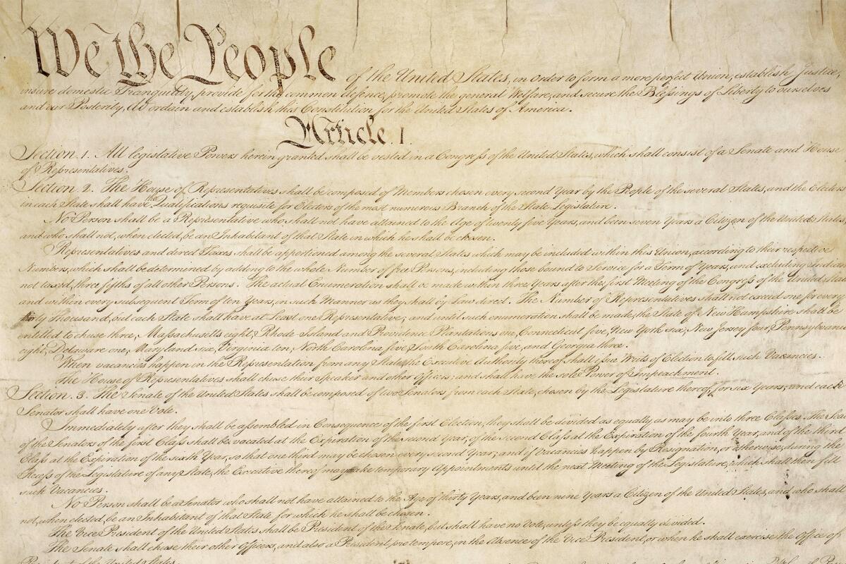 A portion of the first page of the U.S. Constitution.