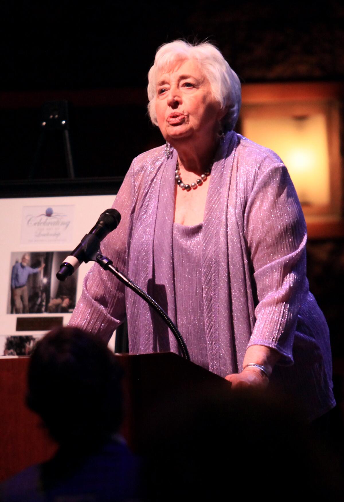 Mayor's award recipient Norma Hertzog speaks at the Costa Mesa mayor's dinner in May 2014.