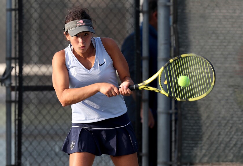 Marina singles player Mika Ikemori returns a volley against Sunny Hills' Daniela Borruel.