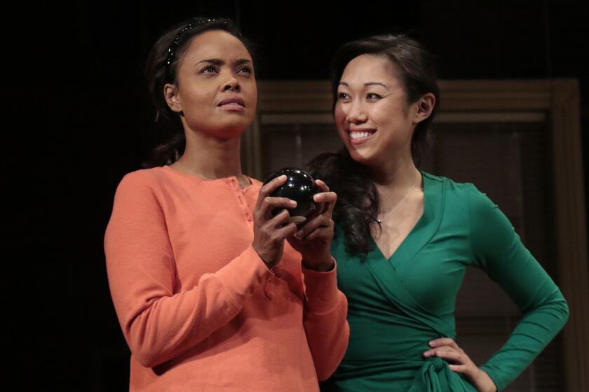 Sharon Leal, left, and Angela Lin in "Stop Kiss" at Pasadena Playhouse on Nov. 2, 2014.