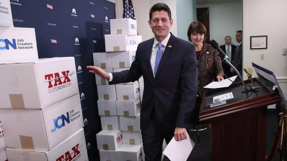 House Speaker Paul Ryan (R-Wis.) arrives for a news conference about the tax plan.