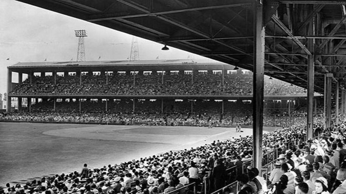 Aug. 21, 1943: A turnout of 21,742 paying fans attended a benefit game between major league stars, led by Joe DiMaggio, and a team composed of Hollywood stars and Los Angeles Angels players.