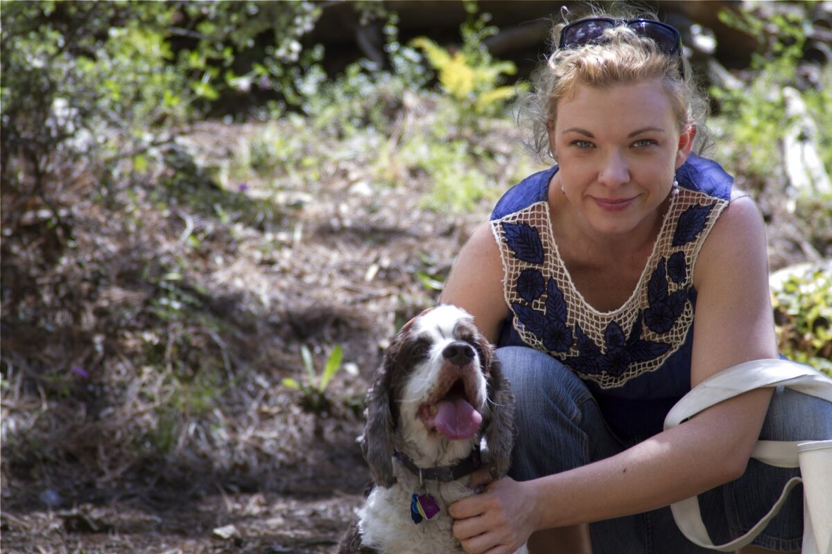 Kim Kelly with her dog, Katie. — University of Arizona