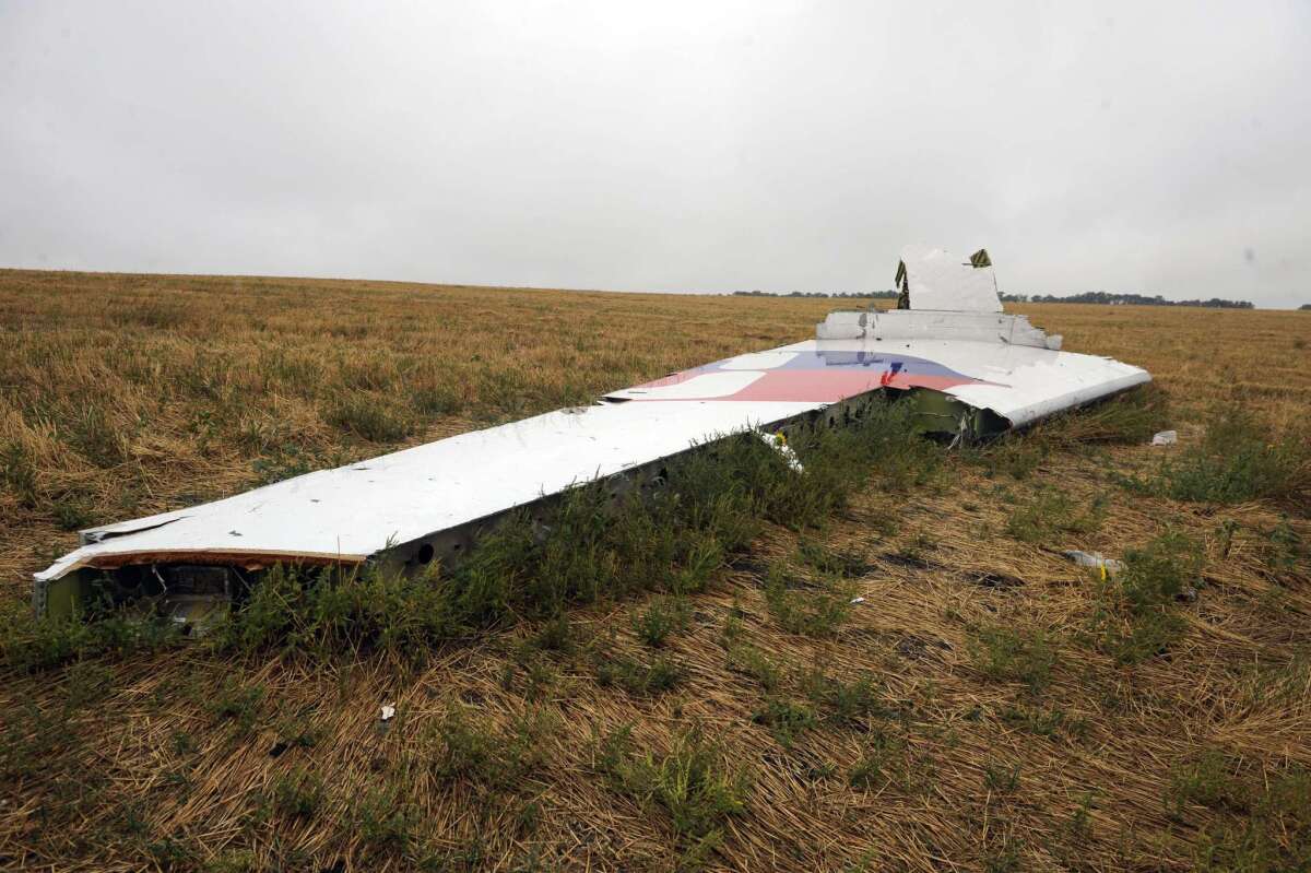 A part of Malaysia Airlines Flight 17 at the crash site in the Ukraine village of Hrabove, east of Donetsk.