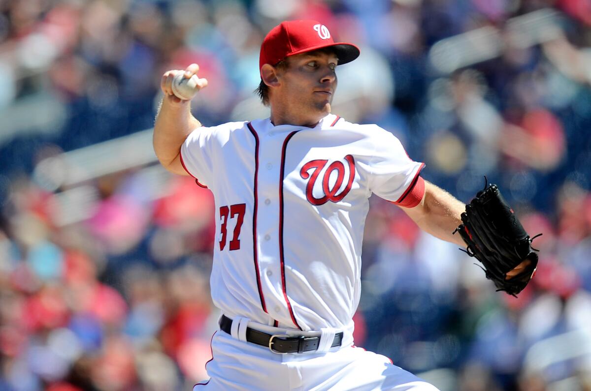 Nationals right hander Stephen Strasburg pitches in the first inning against the Twins on Apr. 24.